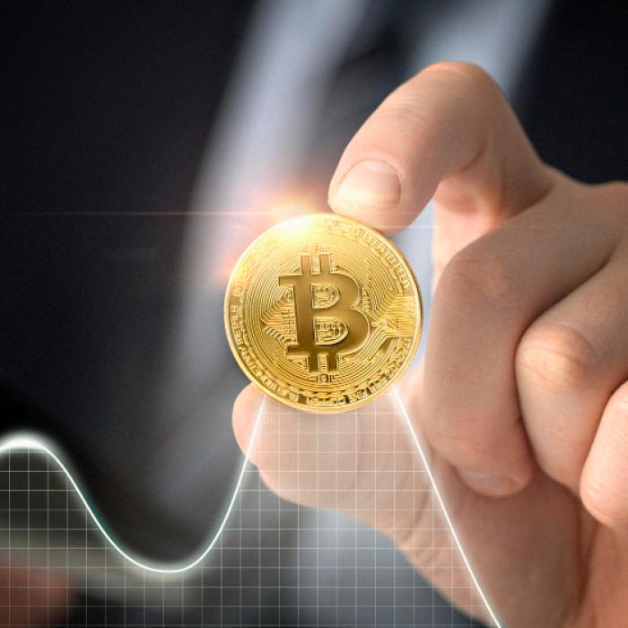 Bitcoin ar putea atinge valoarea de 100.000 dolari luna viitoare, spun experții