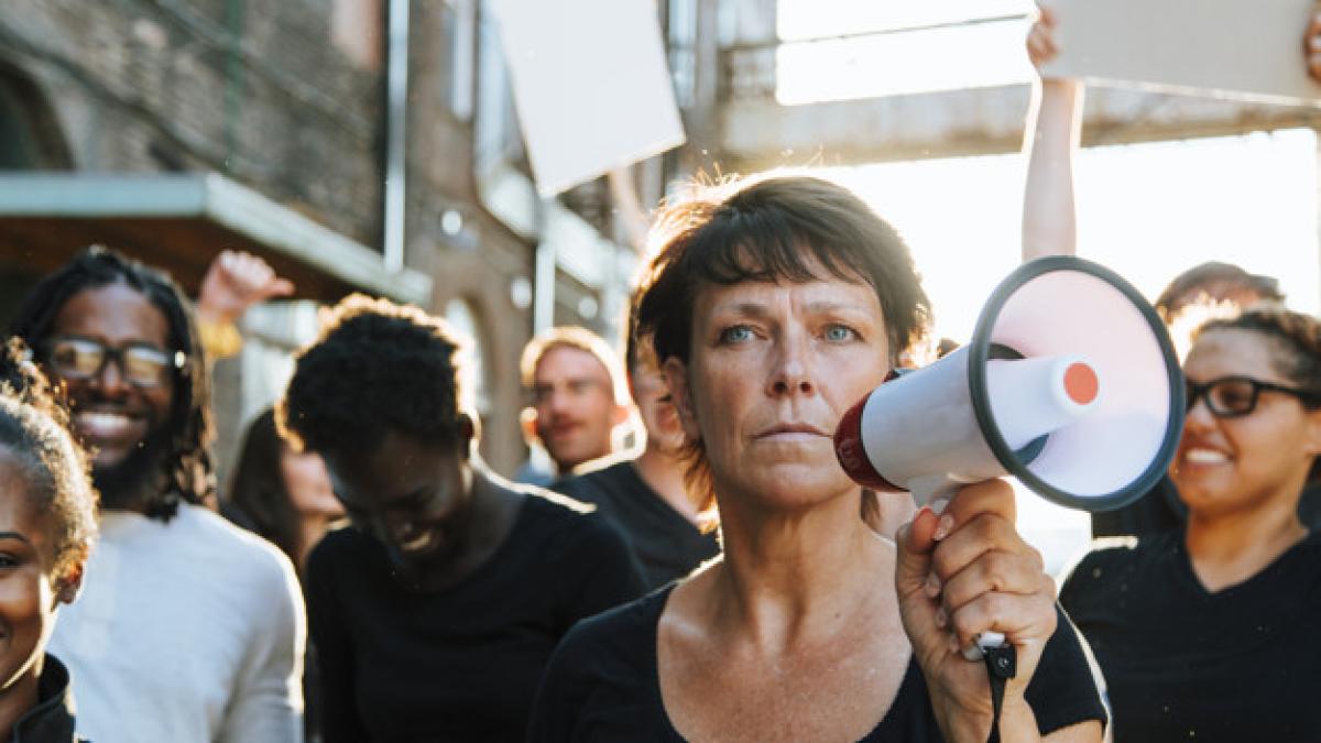 feminist_with_megaphone_protest_53876_87296_69992700