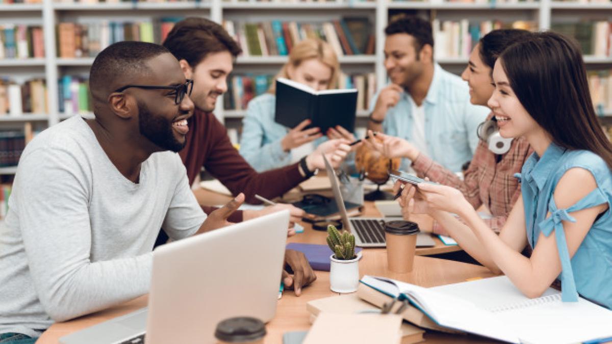 group_ethnic_multicultural_students_sitting_table_99043_4322_61334900