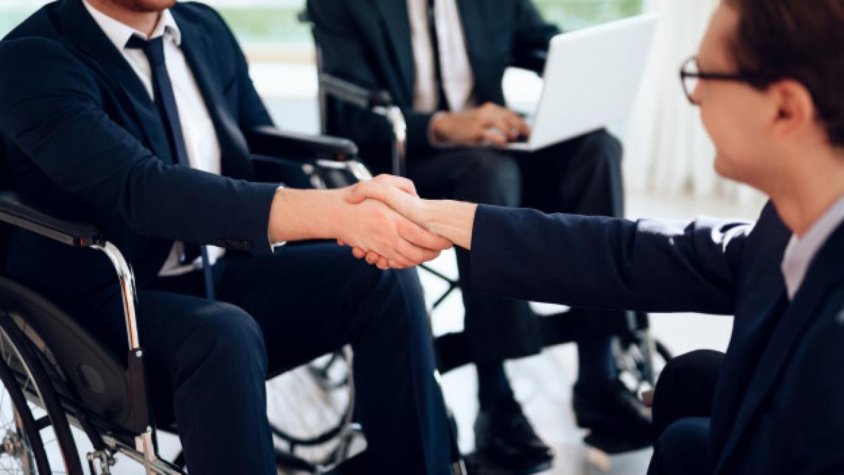 disabled_people_business_suits_bright_room_85574_6910_61374800