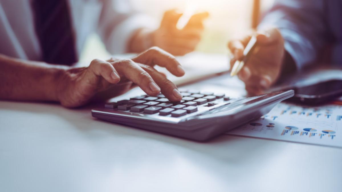 business_asian_middle_age_people_using_calculator_calculating_finance_bills_35675_913_46750200