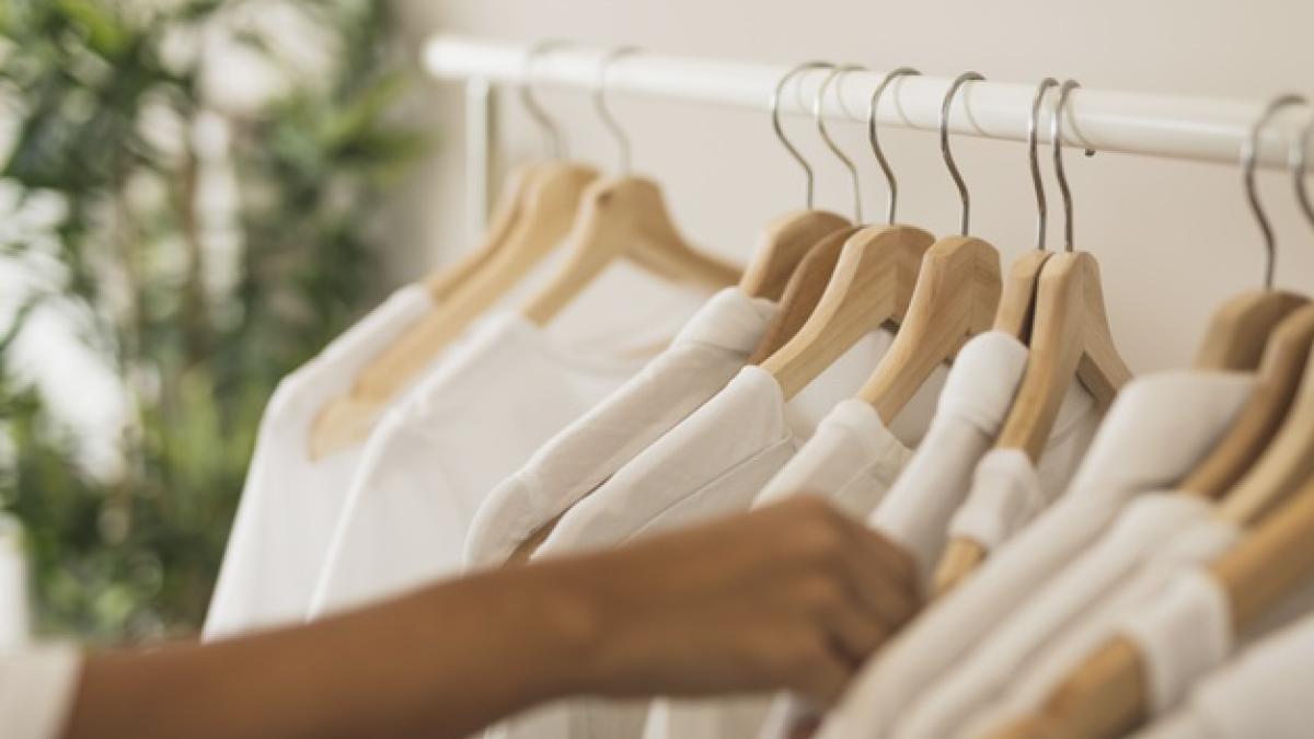 hand_choosing_white_shirt_from_wardrobe_23_2148304835_36969600