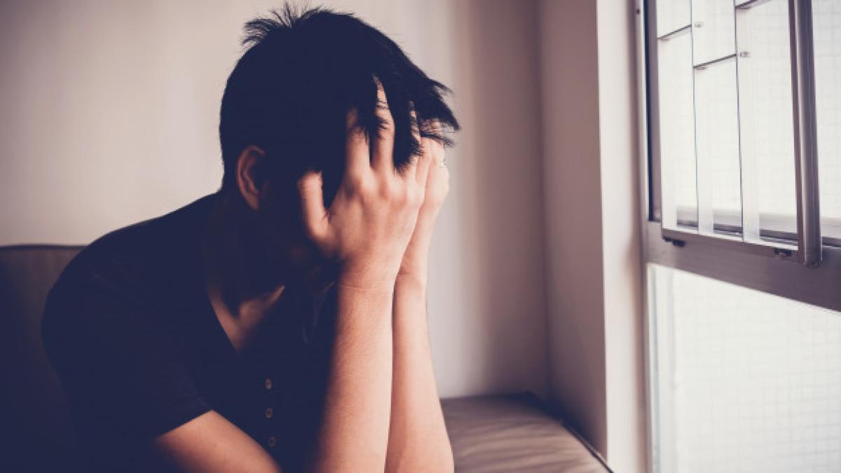 depressed_despair_anxiety_young_man_sitting_alone_home_mental_health_men_health_concept_49149_1215_09568800