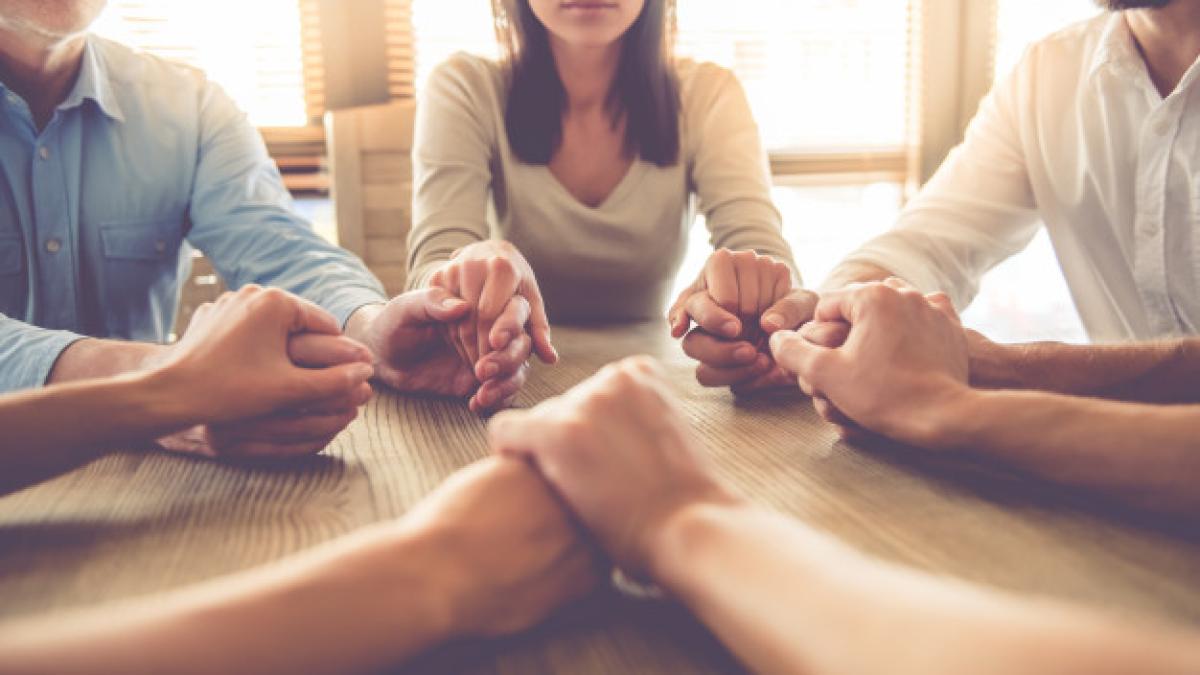 cropped_image_beautiful_business_team_holding_hands_85574_5646_54227000