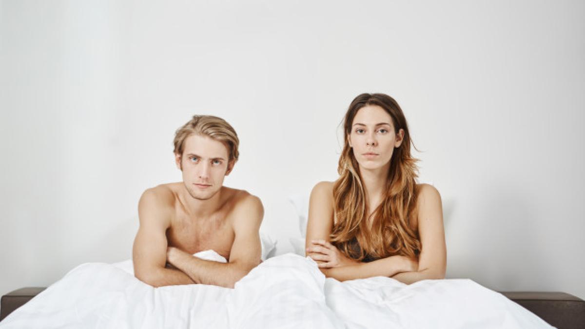 bedroom_shot_couple_sitting_bed_naked_blanket_with_crossed_hands_unsatisfied_expression_young_adults_relationship_have_problems_their_sexual_life_they_want_discuss_176420_8740_75447400