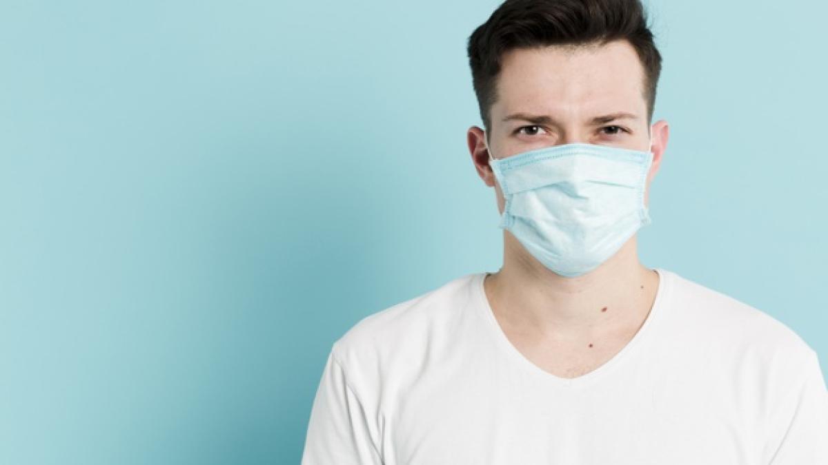 front_view_man_posing_while_wearing_medical_mask_23_2148445120_95326300