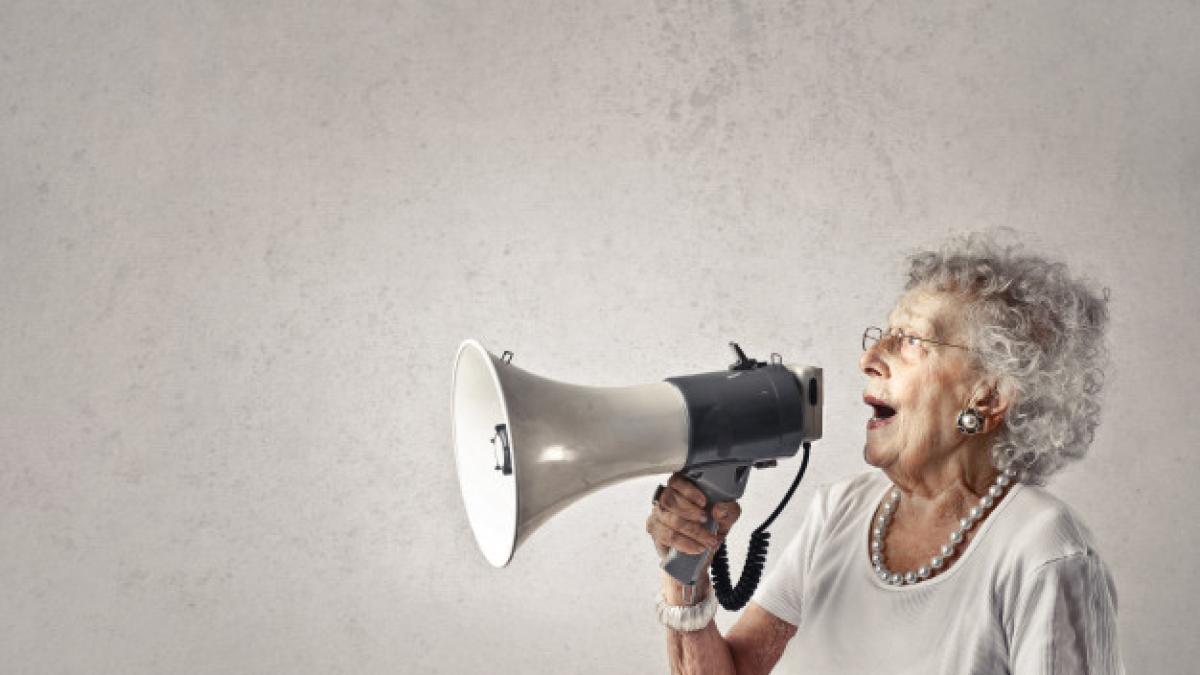 senior_lady_talking_into_megaphone_102671_6512_35866200