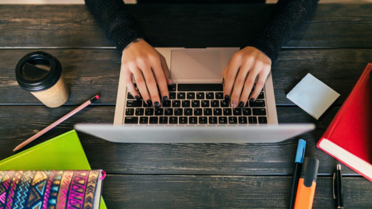 view_from_hands_pretty_woman_sitting_table_black_shirt_working_laptop_co_working_office_stationery_hands_typing_drinking_coffee_freelance_285396_84_77693300