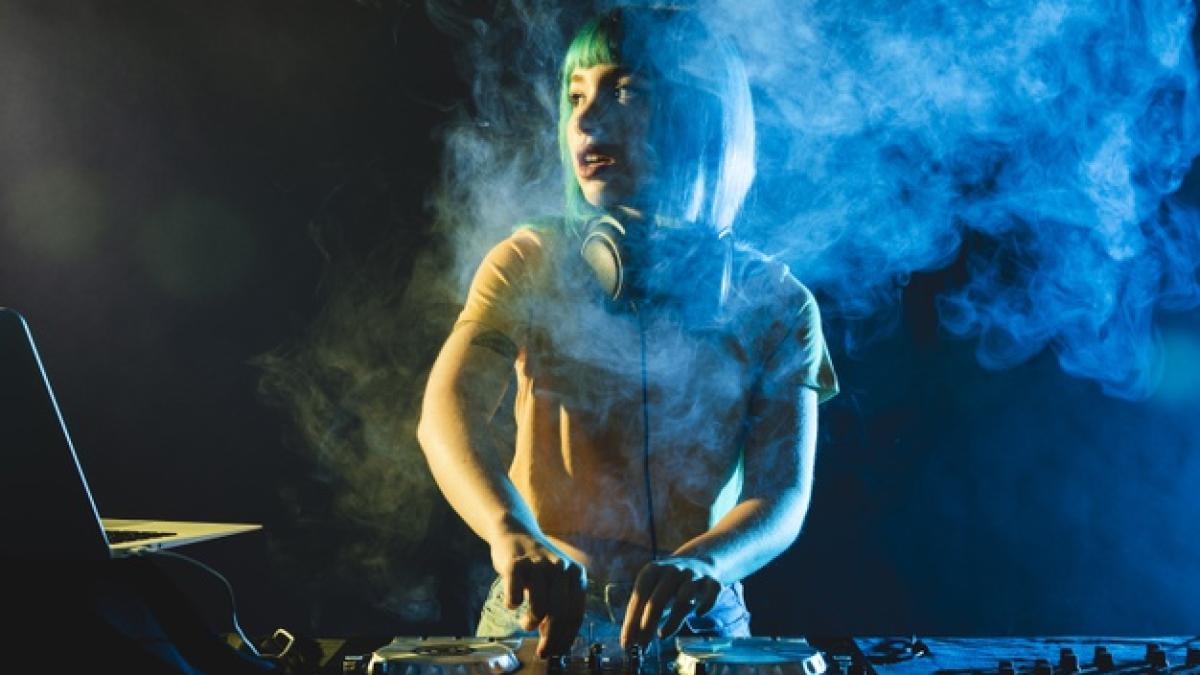female_dj_club_covered_by_colorful_smoke_23_2148325411_69044600