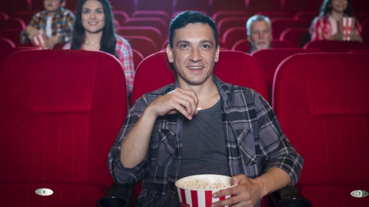 man_watching_movie_cinema_23_2148202073_64296800