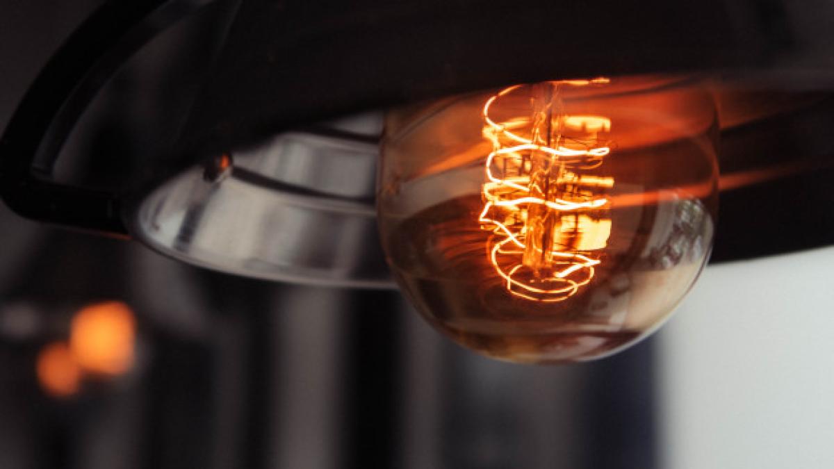closeup_shot_lit_large_lightbulb_with_blurred_background_181624_2051_48630600