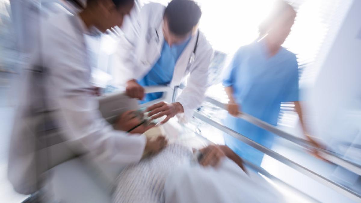 team-doctors-putting-oxygen-mask-male-senior-patient-face_107420-63866_31623000