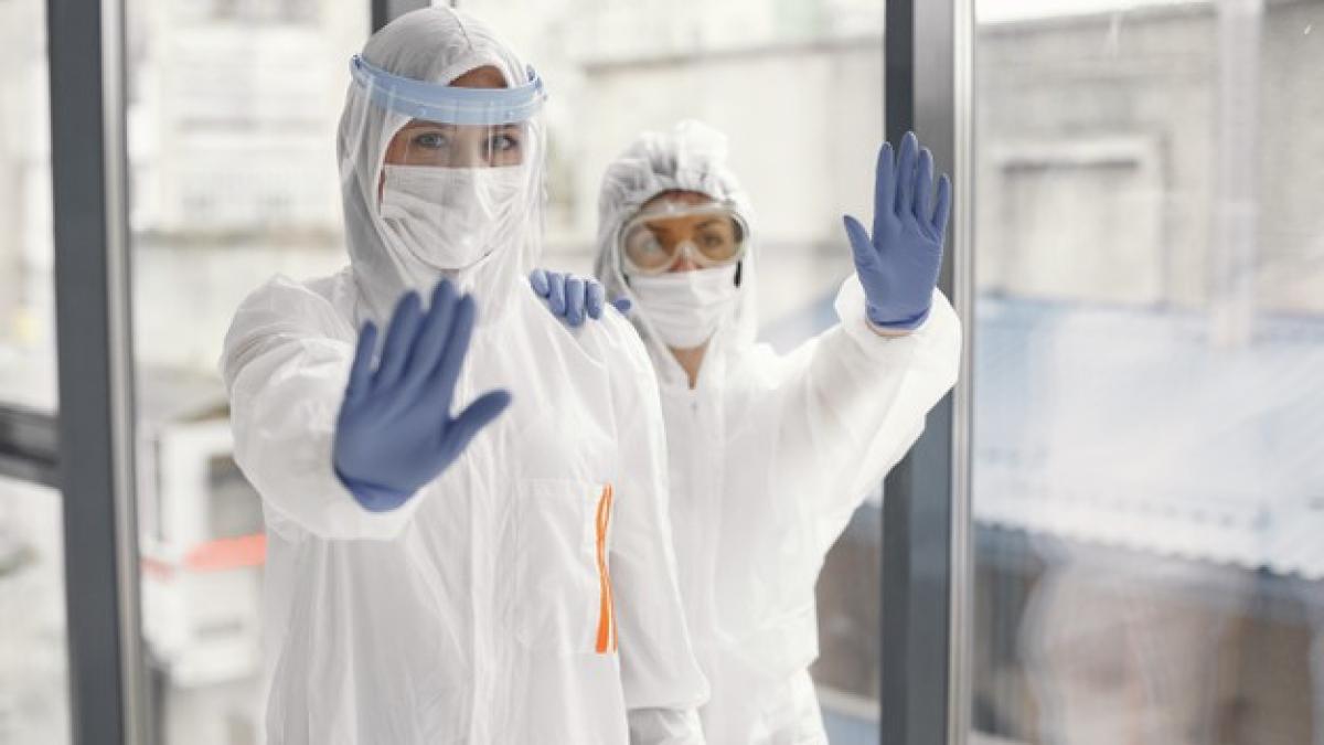 coronavirus-pandemic-covid-2019-protective-suit-googles-gloves-mask_1157-43387_20210400