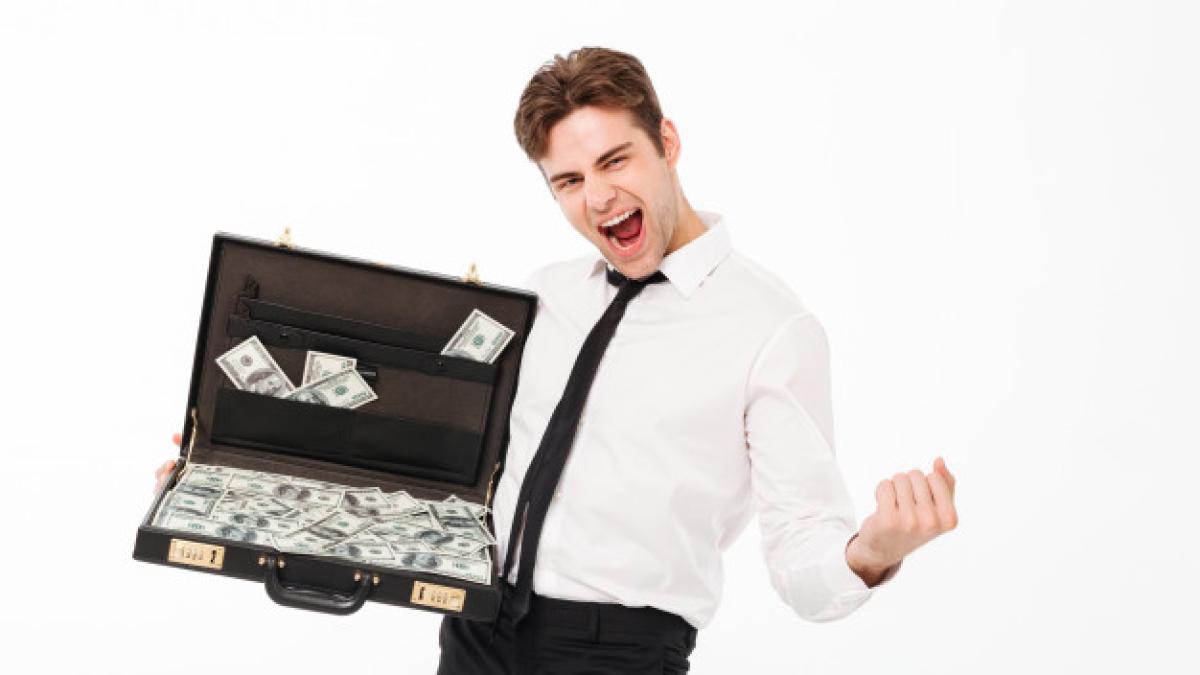 portrait-happy-young-businessman_171337-5240_36348200