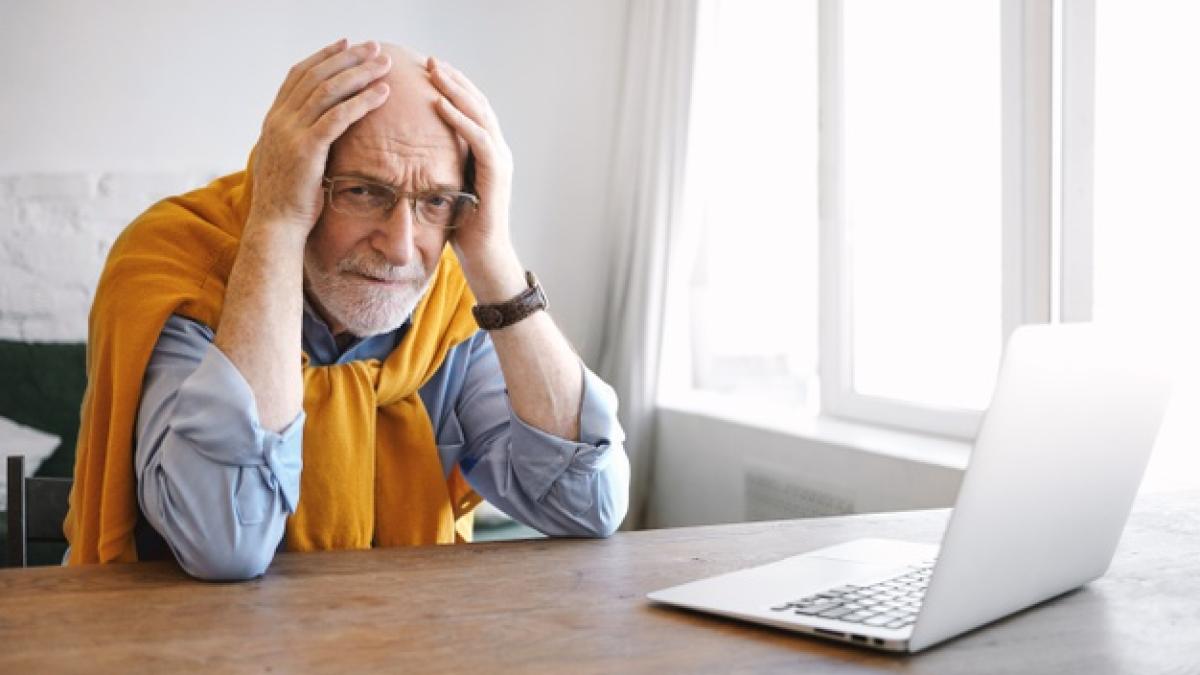 horizontal-shot-frustrated-senior-caucasian-male-employee-with-gray-beard-eyewear-holding-hands-his-bald-head-having-panic-look-feeling-stressed-because-deadline-age-job_343059-1769_93215200