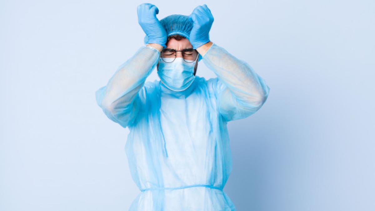 young-man-feeling-stressed-anxious-depressed-frustrated-with-headache-raising-both-hands-head-coronavirus-concept_1194-47925_25519200