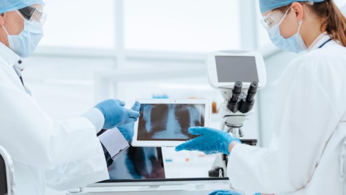 close-up-scientists-protective-masks-discussing-results-testing-concept-health-care_160672-91_41730800