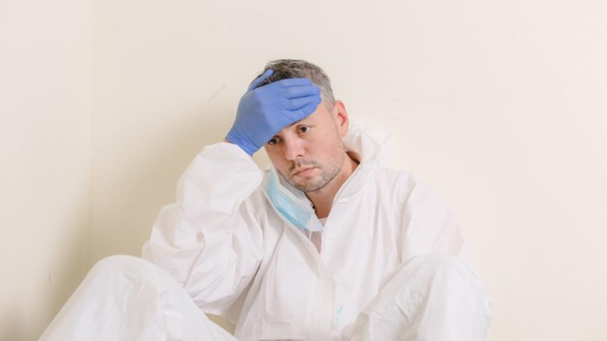 sad-doctor-protective-suit-sits-floor-corridor-hospital-health-workers-during-covid19-coronavirus-pandemic_340855-652_64277900