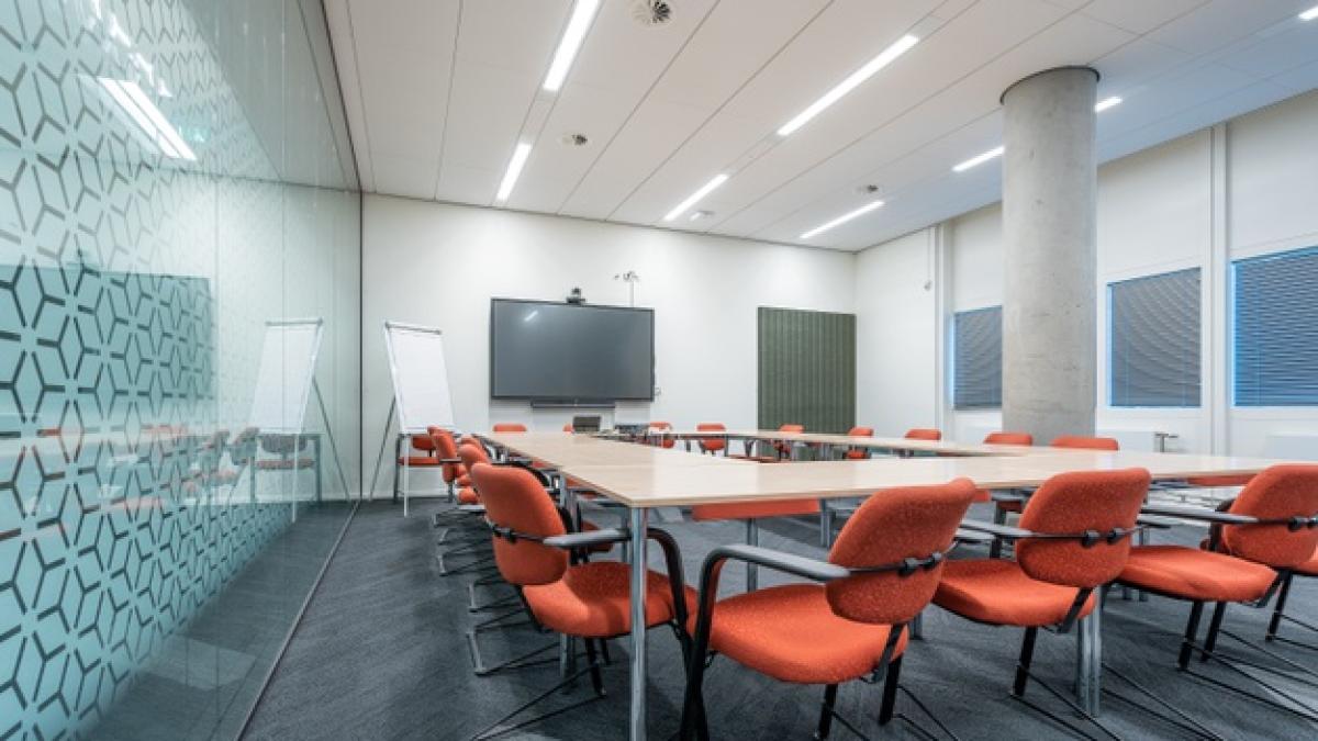 conference-room-interior-modern-office-with-white-walls-monitor_181624-22217_98222200