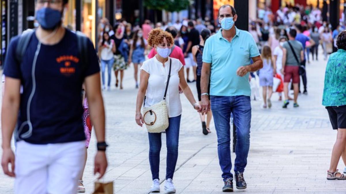 people-walk-comercial-street-named-meritxell-after-covid19_181624-28812_69045000