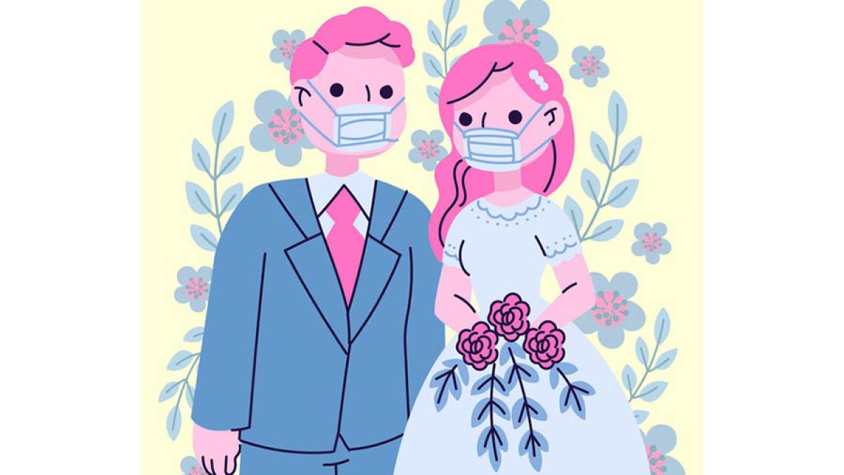 wedding-couple-wearing-face-masks_23-2148621320_62921600