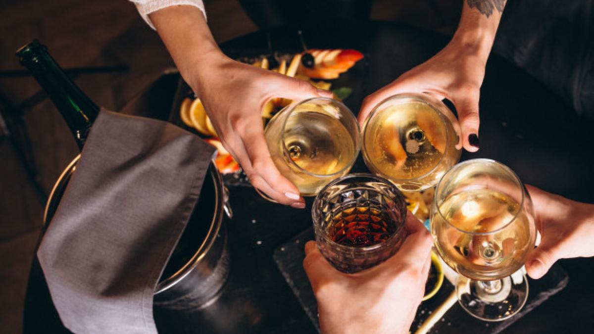 male-female-hands-close-up-with-cocktails_1303-13495_30738400