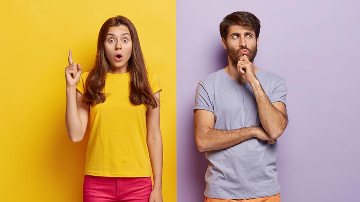 shocked-woman-points-upwards-keeps-mouth-opened-thoughtful-unshaven-man-holds-chin_12779900