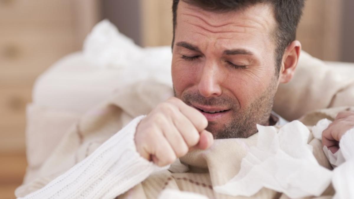 sick_man_lying_sofa_living_room_329181_662_12942300