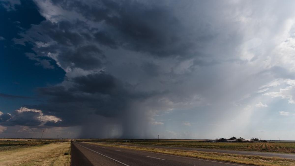 long-asphalt-road-cloudy-rainy-sky_181624-29166_02078300