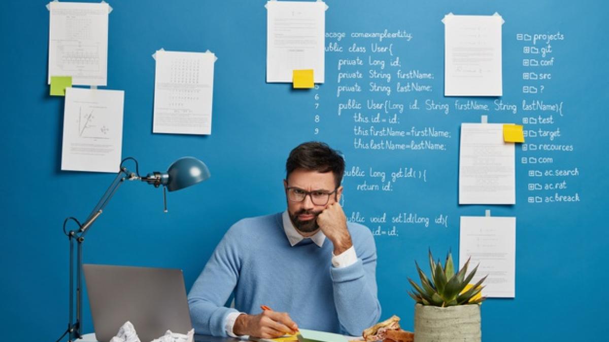 unhappy-tired-male-professional-writes-notepad-has-angry-expression-no-creative-ideas-making-project_273609-34354_17207200