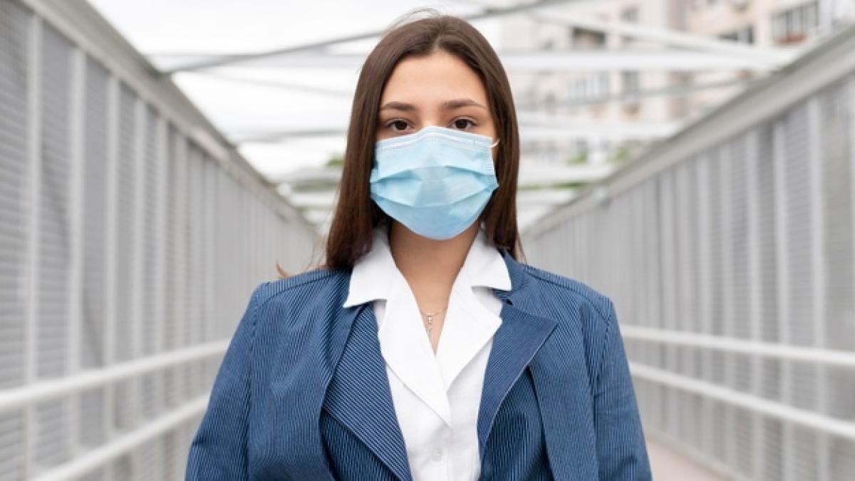 young-woman-wearing-face-mask_23-2148998371_99311700