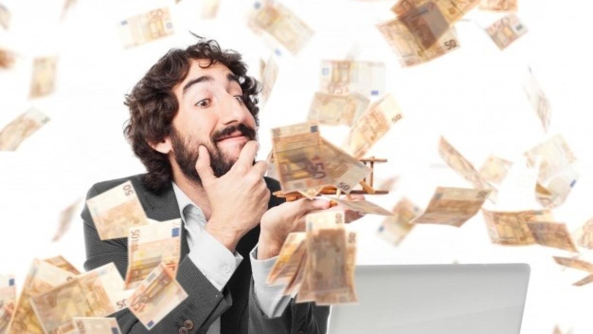 pensive-businessman-money-rain_1154-229-1_91091700