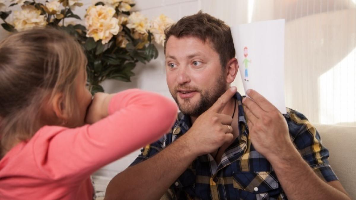 father-holding-drawing-his-daughter_23-2147624038_37188600