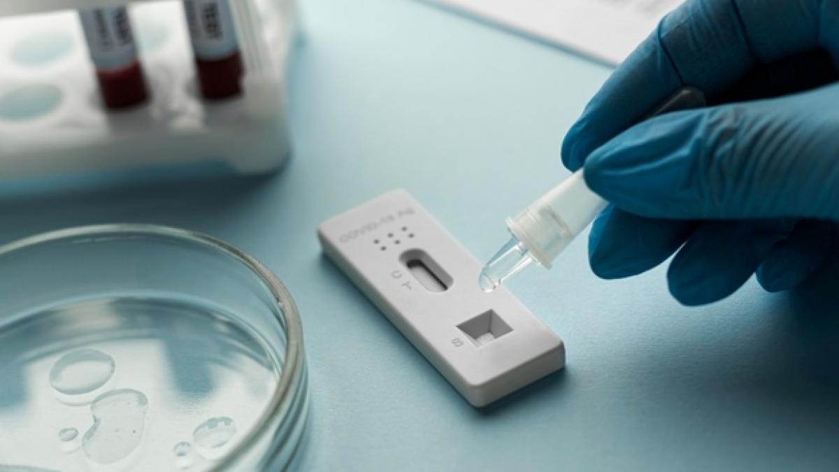 hand-with-protective-gloves-making-covid-test_23-2148958355_25840700