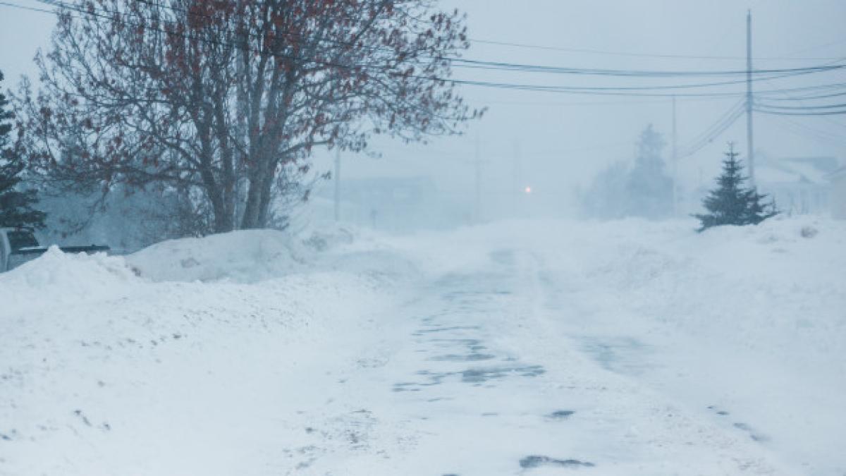snow-covered-road-during-daytime_249578-494_63892800