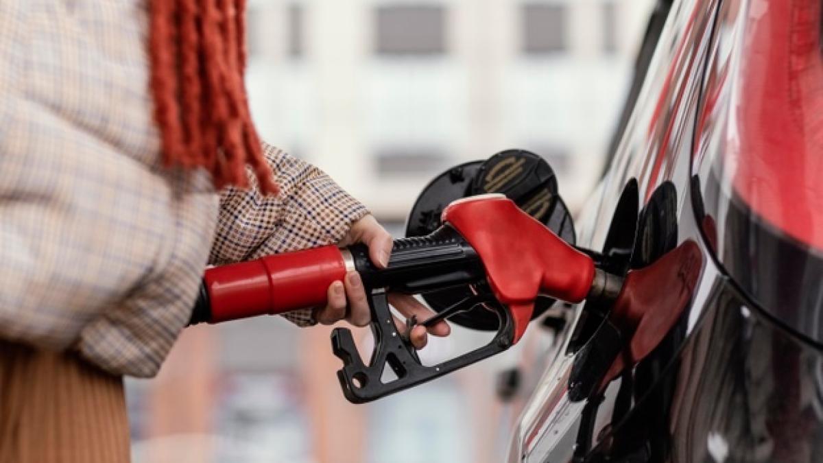 close-up-woman-gas-station_23-2148906372_69842900