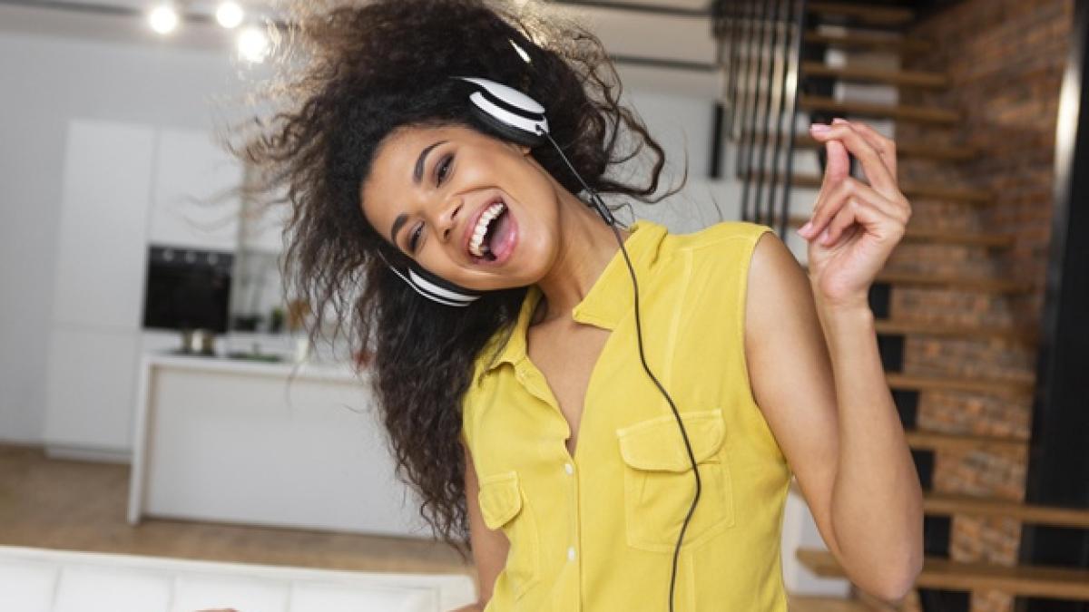 young-woman-listening-music_23-2148953573_82302200