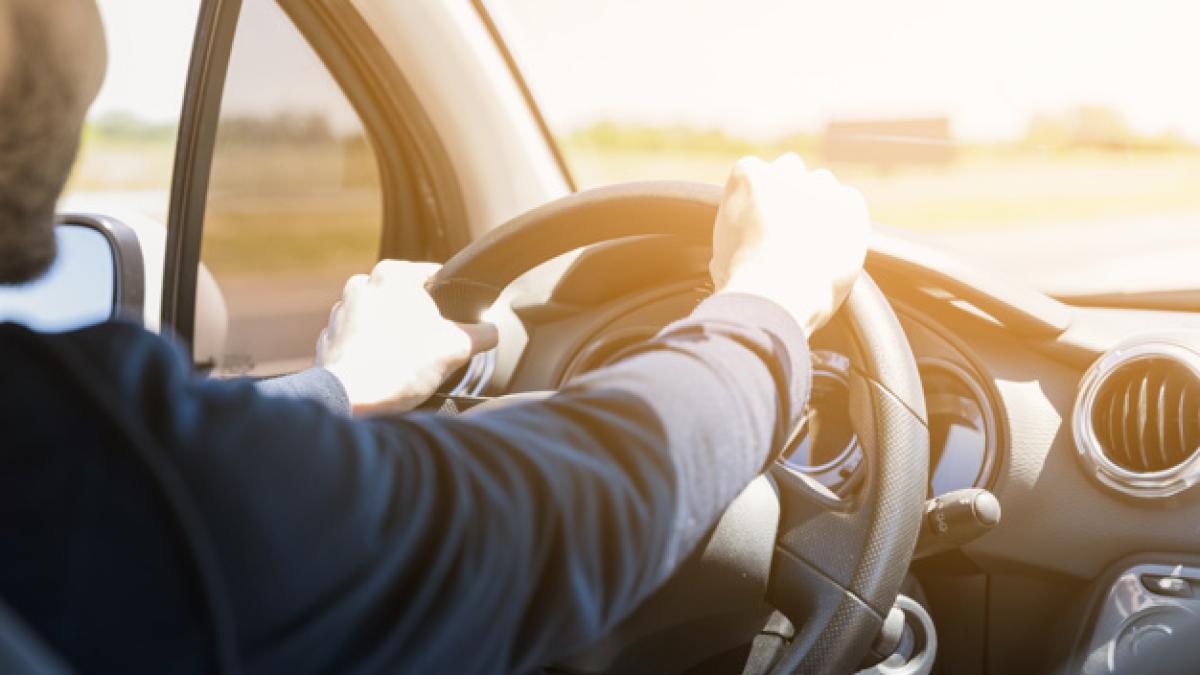 steering_wheel_illuminated_by_ray_sun_23_2148006492_02724800