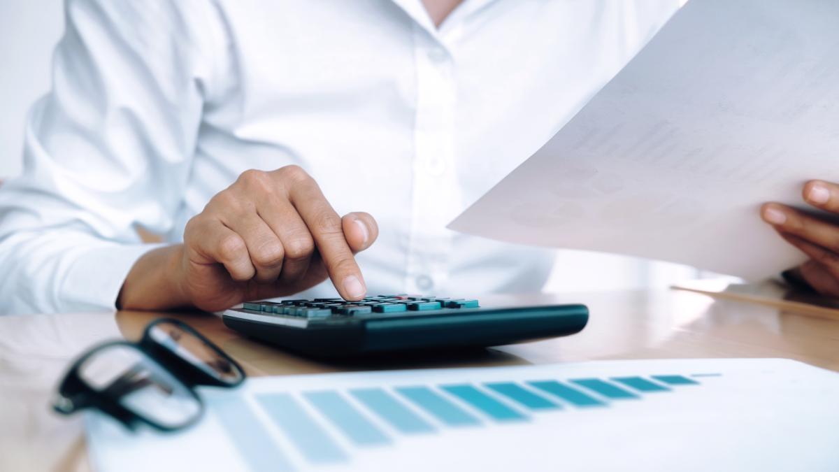 finances-saving-economy-concept-female-accountant-banker-use-calculator_62344300