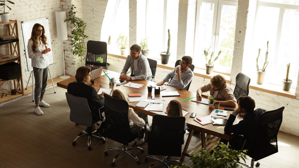 top-view-image-motivated-employees-working-together-office-representing-project-concept-business_04320200