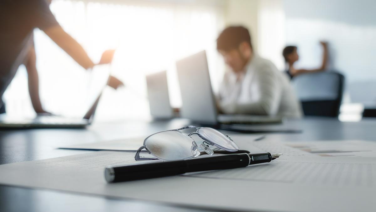 business-concept-with-copy-space-office-desk-table-with-pen-focus-analysis-chart-computer-notebook-cup-coffee-desk-vintage-tone-retro-filter-selective-focus_90820400
