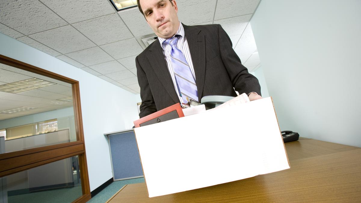 fired-businessman-clearing-out-his-desk-1939850_87127500