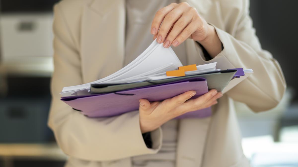 young-adult-organizing-documents-2_12256400