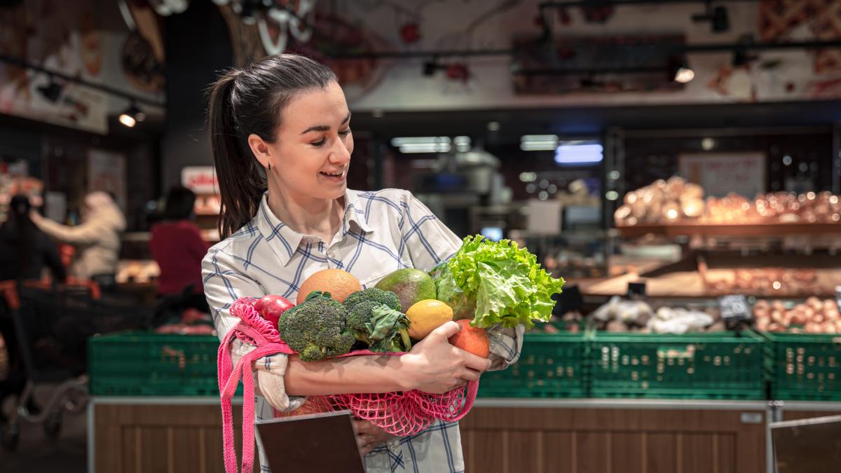 young-woman-supermarket-with-vegetables-fruits-buying-groceries_06545600