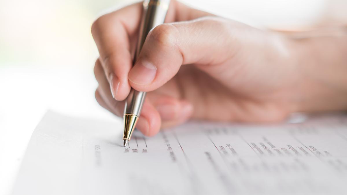 hand-with-pen-application-form_99626000