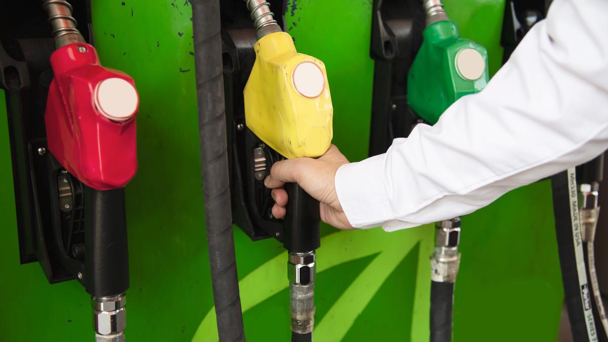 man-putting-gasoline-fuel-into-his-car-pump-gas-station_28787700
