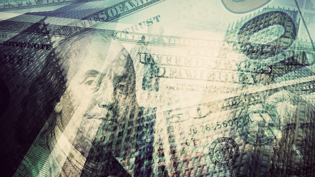 transparent-bills-with-buildings_50994200