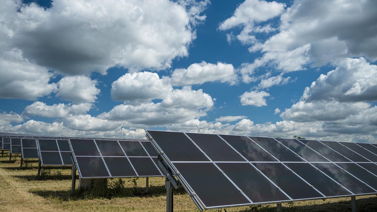 solar-panels-used-renewable-energy-field-sky-full-clouds_67601600