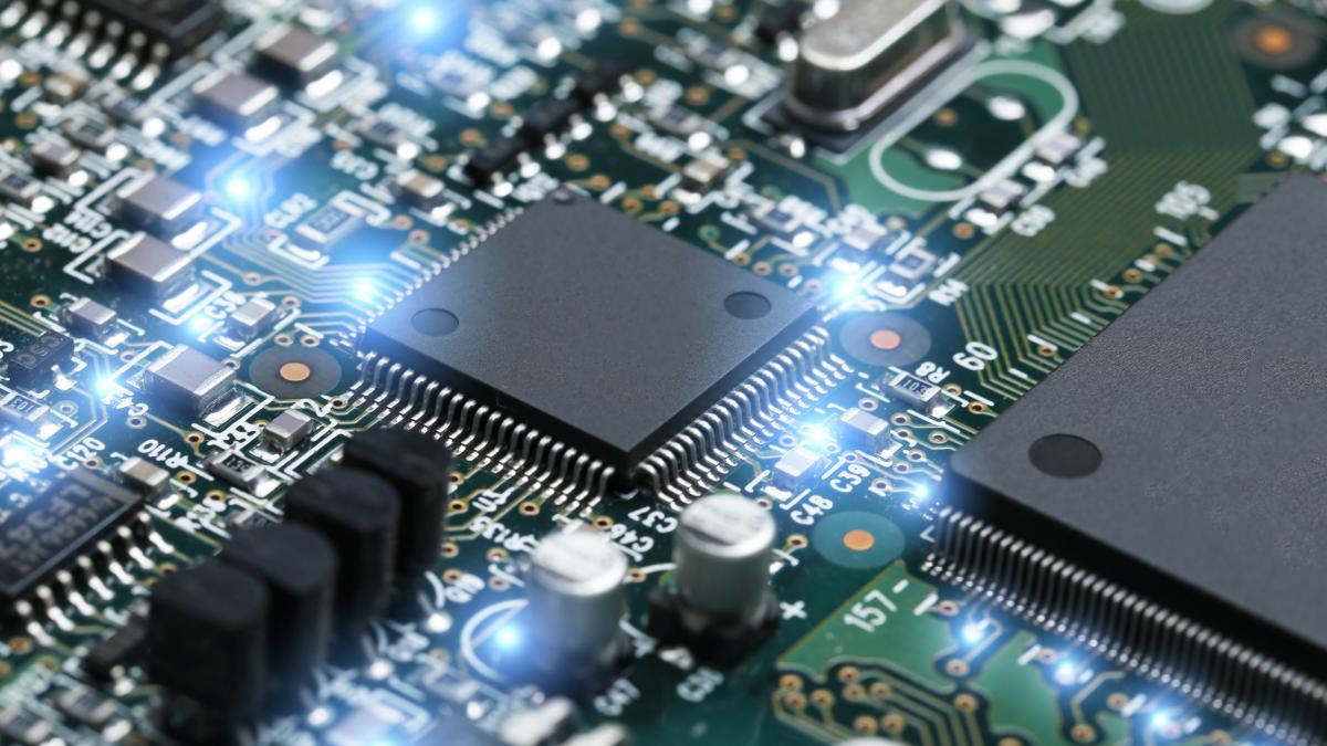 closeup-electronic-circuit-board-with-cpu-microchip-electronic-components-background_47710300