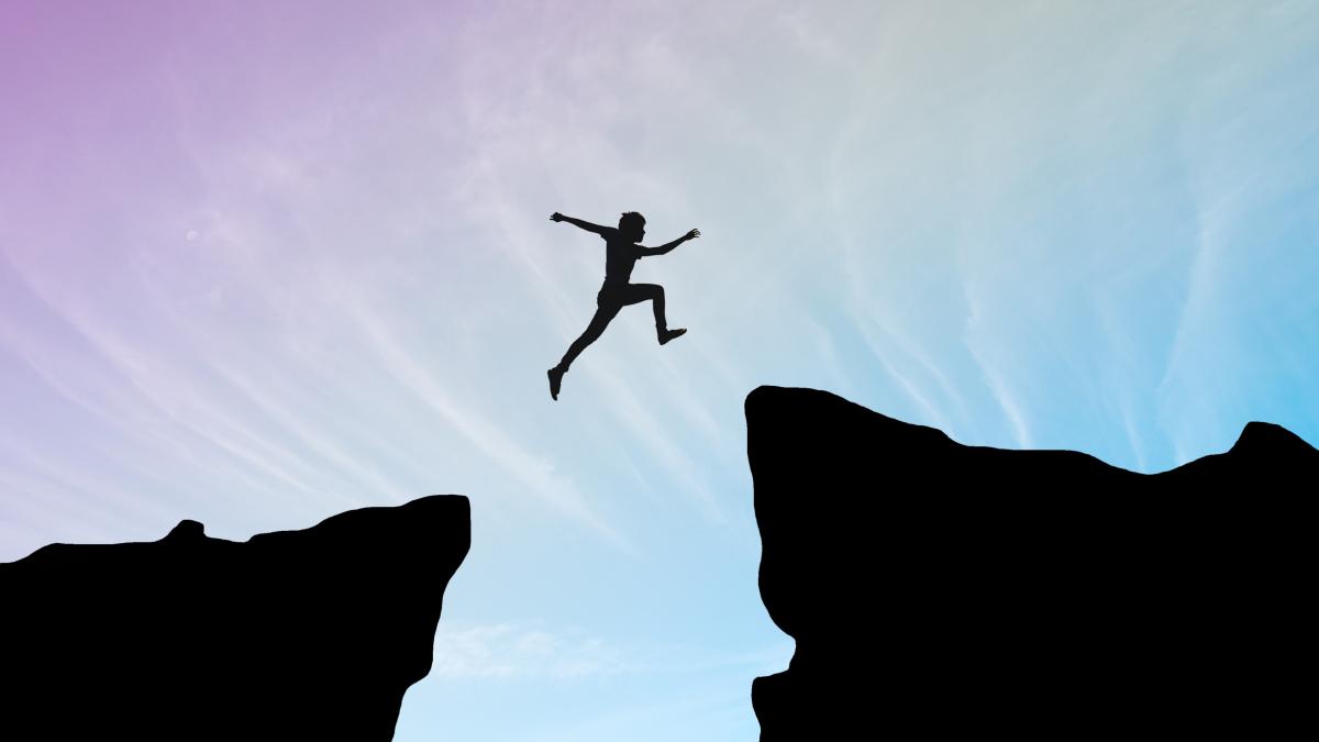 man-jump-through-gap-hill-man-jumping-cliff-blue-sky-business-concept-idea_34445800